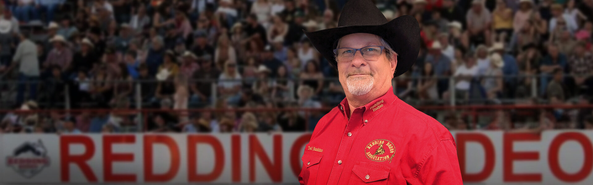 Man in a cowboy hat at a rodeo
