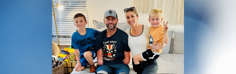 A family sitting on a couch