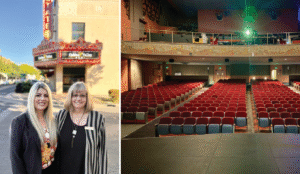 Two women standing in front of a theater marquee